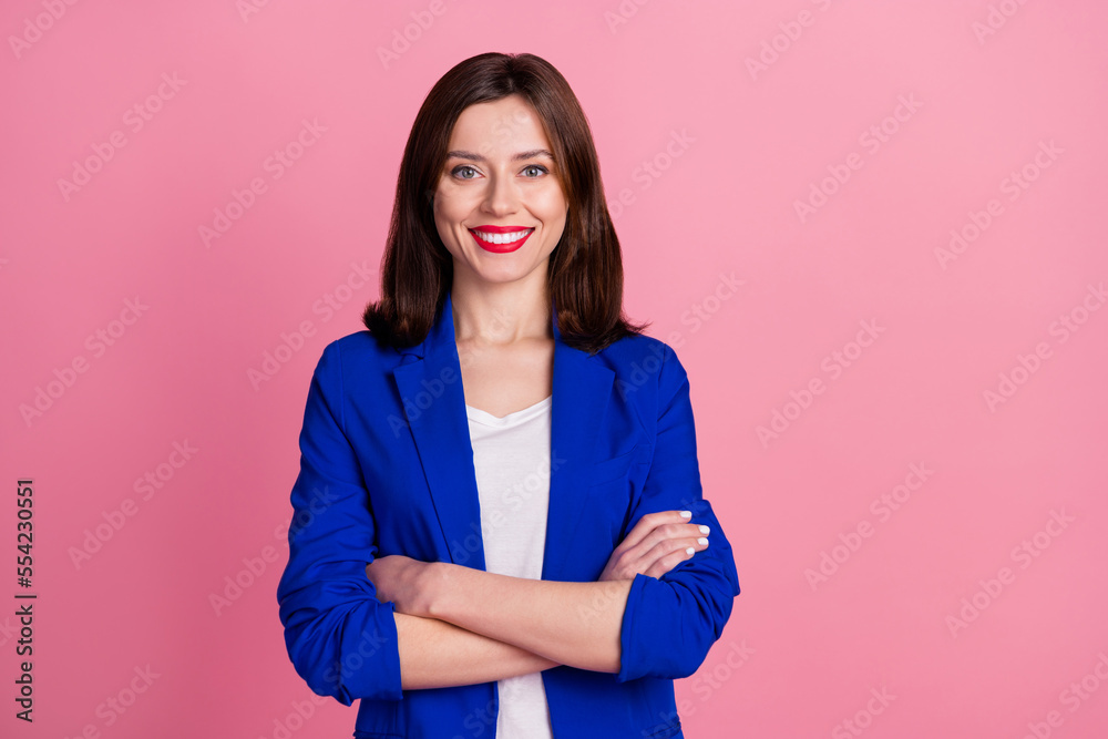 Photo portrait of young successful lady wear blue formal outfit folded hands toothy smile high finance profit isolated on pink color background Photo portrait of young successful lady wear blue formal outfit folded hands toothy smile high finance profit isolated on pink color background