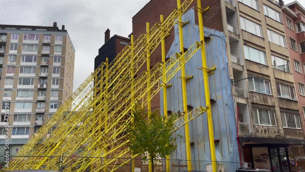 A building reinforced with steel beams which help it not to collapse in Brussels, Belgium