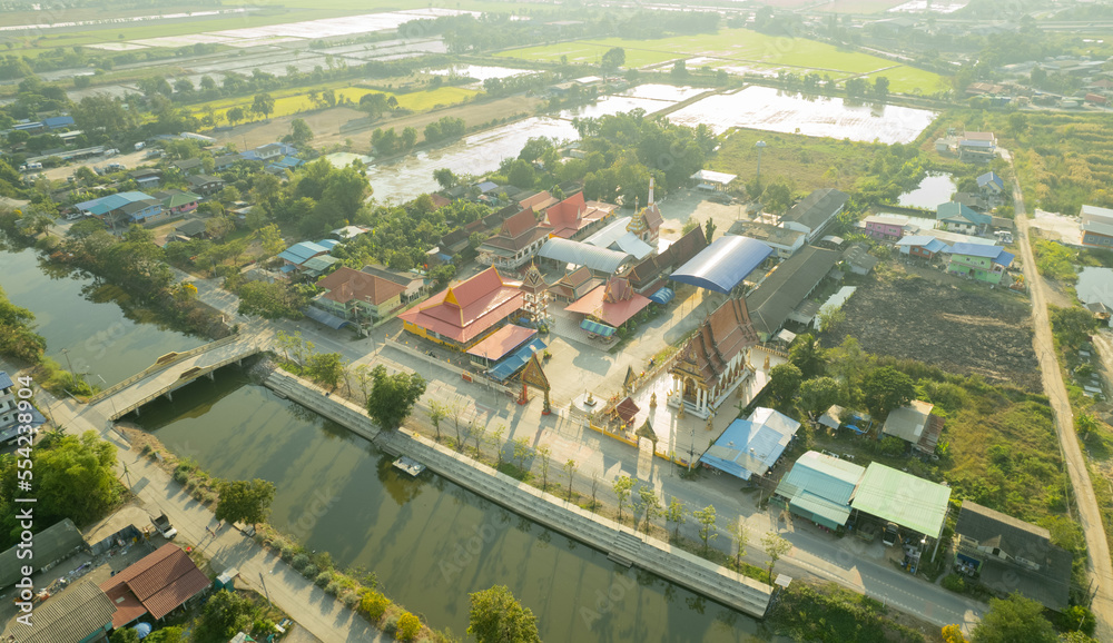 Aerial city view from flying drone at Wat Prem Prachakon ,Chiang Rak Noi, Bang Pa-in District, Phra Nakhon Si Ayutthaya,Thailand