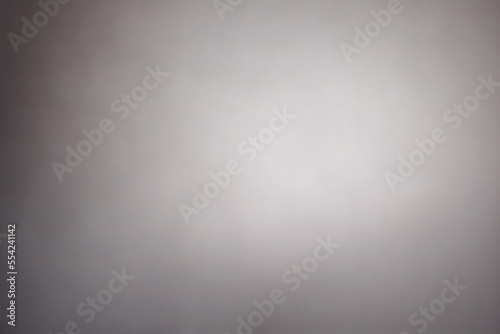 Hellgrauer Hintergrund mit Lichtspot