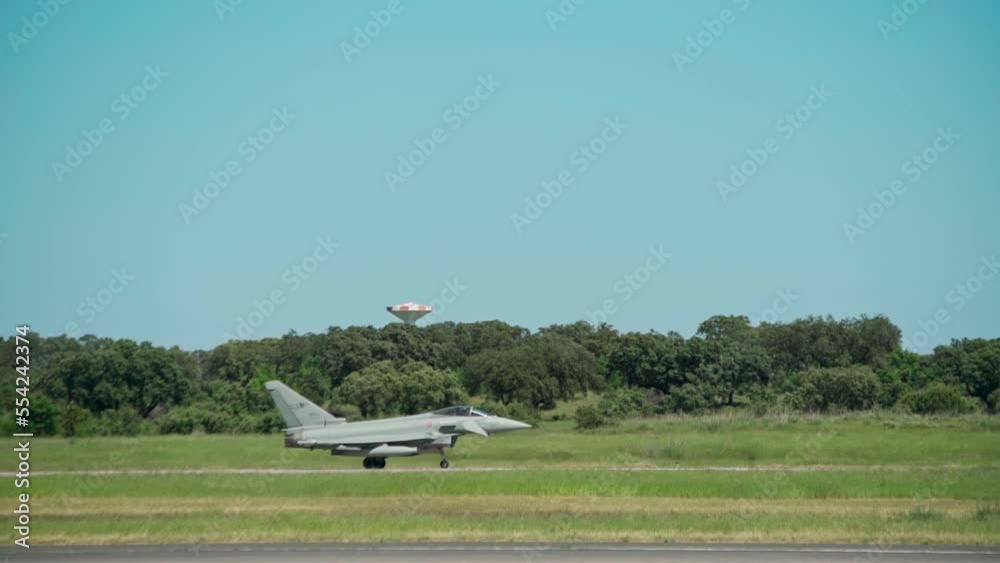 Military supersonic fighter on runway before taking off on a secret mission. Concept of the world arms race in a crisis. Military supersonic fighter on runway before taking off on a secret mission. Concept of the world arms race in a crisis.
