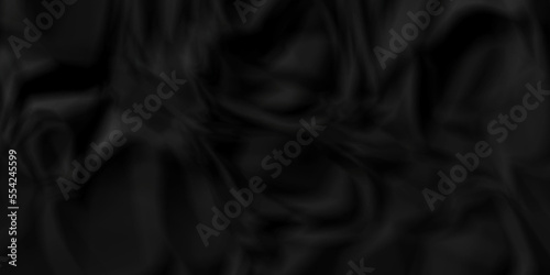 Dark Black facbric paper backdrop crumpled texture. dark black textured crumpled black paper background. panorama black paper texture background, crumpled pattern.