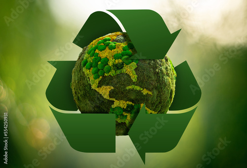 Green planet Earth with recycling symbol. Concept photo