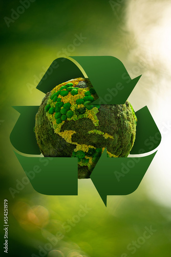 Green planet Earth with recycling symbol. Concept