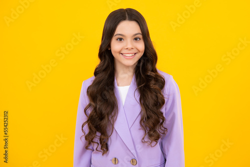 Happy teenager, positive and smiling emotions of teen girl. Adorable smiling little girl child isolated on a white background.