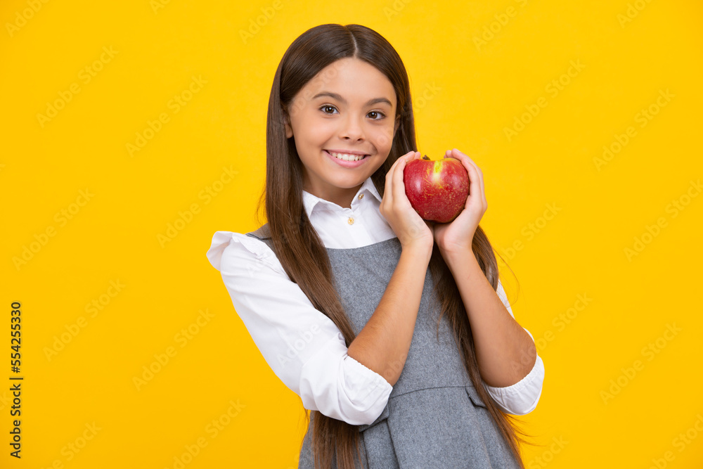 Fresh fruit. Teenager girl hold apples on yellow isolated studio background. Child nutrition. Happy girl face, positive and smiling emotions. Fresh fruit. Teenager girl hold apples on yellow isolated studio background. Child nutrition. Happy girl face, positive and smiling emotions.