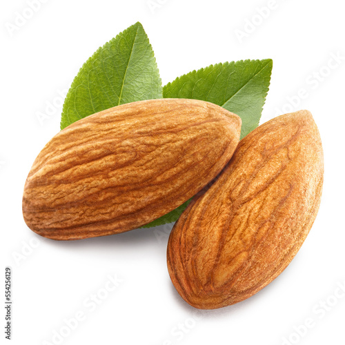 Two almonds with leaves close-up, isolated on white background