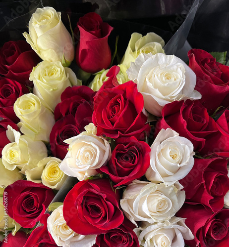 Bouquet of red  white and yellowish roses