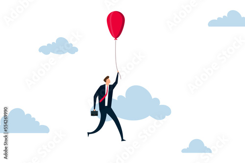 Financial bubble by QE injected money concept, businessman investor holding flying balloon tight afraid to fall off.