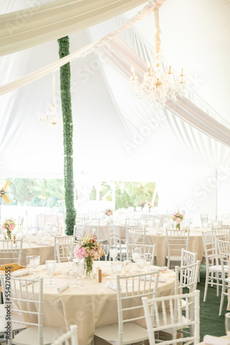 Outdoor white tent wedding reception