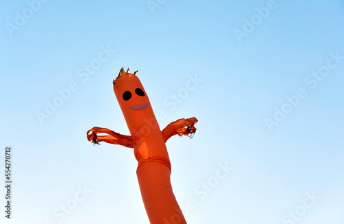 Inflatable air dancer balloon man amusement park. Inflatable air dancer wave. Advertising tube man