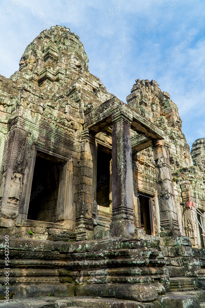 Vertical view of temple towers at Bayon Temple in Angkor Wat, Cambodia