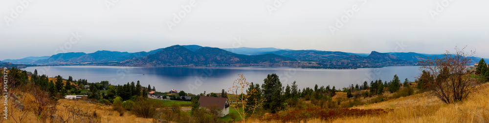 Lower Bench trail through the vineyards and Okanagan Lake in the Naramata Bench Wine Region; Naramata, British Columbia, Canada
