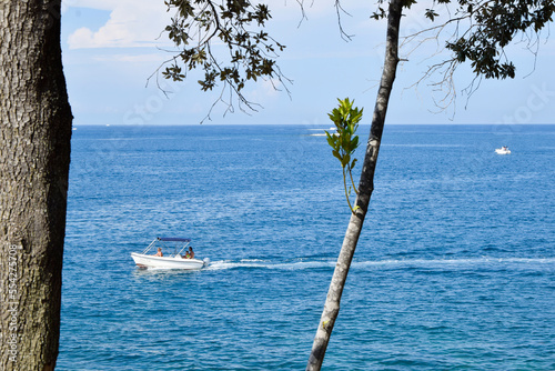 Speed boat in blue sea. Adriatic sea, Porec, Croatia