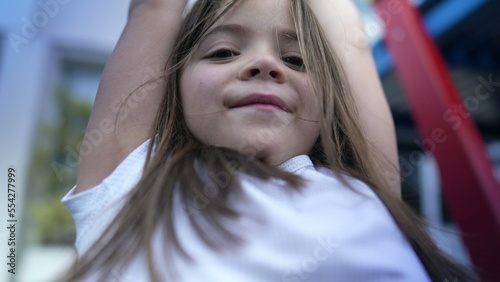 Photography Small girl holding into metal bar at playground child hand holds on monkey bar