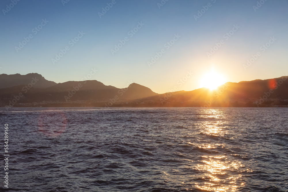 Capri Island in Bay of Naples, Italy. Sunny Sunrise Sky. Nature Background.