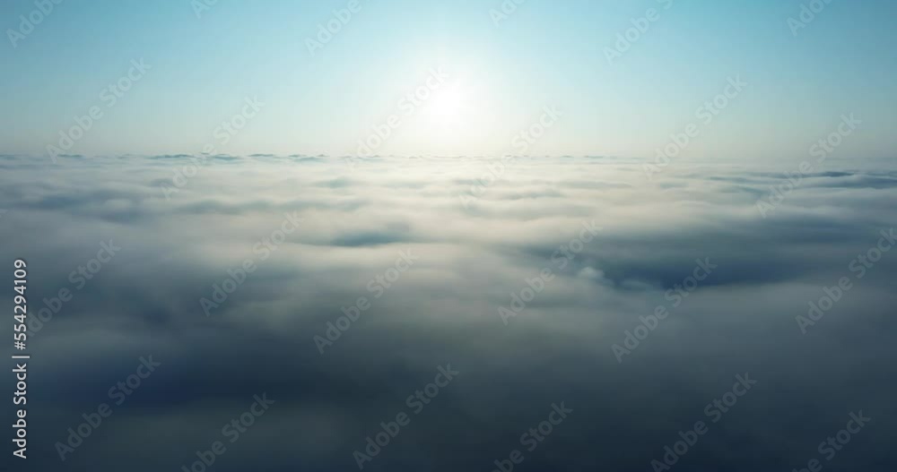 Aerial view Cinematic video Scene of the sun over cloud texture background. Amazing video landscape drone view over sea of fog texture background or clouds texture Aerial view Cinematic video Scene of the sun over cloud texture background. Amazing video landscape drone view over sea of fog texture background or clouds texture