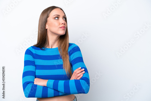 Young caucasian woman isolated on white background looking to the side