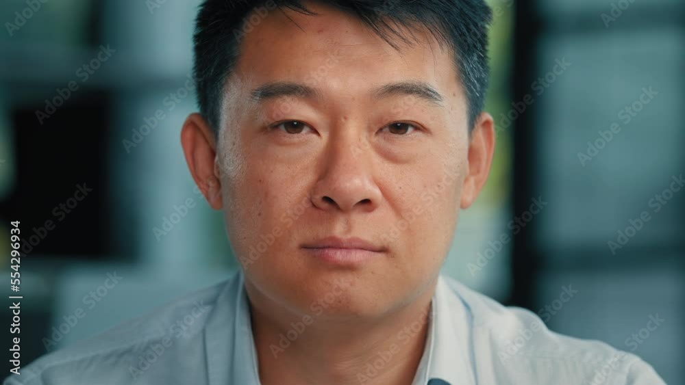 Close up portrait mature Asian man 40s businessman boss employer lawyer leader middle-aged senior Chinese Japanese Korean male posing in modern office looking at camera serious unhappy face expression Close up portrait mature Asian man 40s businessman boss employer lawyer leader middle-aged senior Chinese Japanese Korean male posing in modern office looking at camera serious unhappy face expression