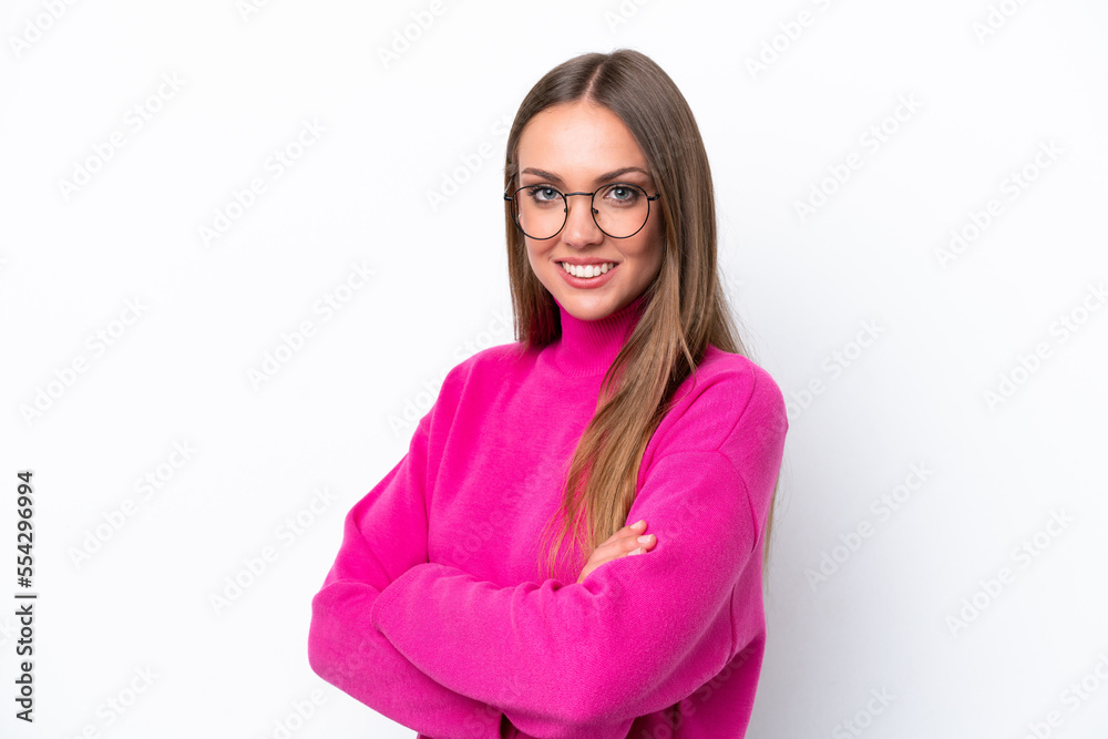 Young caucasian woman isolated on white background with arms crossed and looking forward Young caucasian woman isolated on white background with arms crossed and looking forward