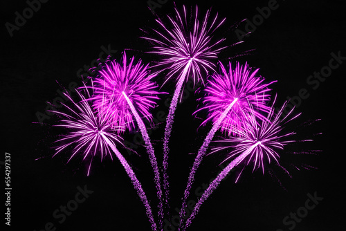 Festival Party New Year's Eve Sylvester or other celebration holiday background greeting card - Pink beautiful firework fireworks pyrotechnics on dark night sky