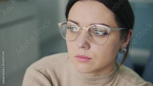 Wallpaper Mural Attractive brunette woman in big fashionable eyeglasses analyzing her lifestyle and behavior sitting in psychologist office, need emotional support and some advices Torontodigital.ca