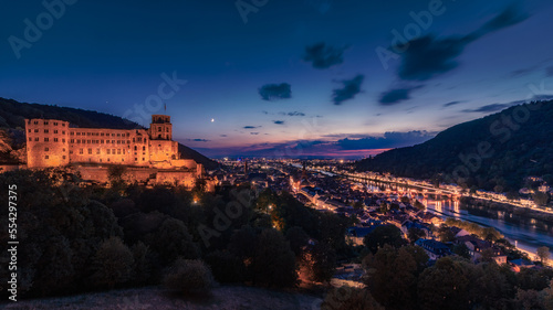 Heidelberg Castle at Night with view on Oldtown and old Bridge