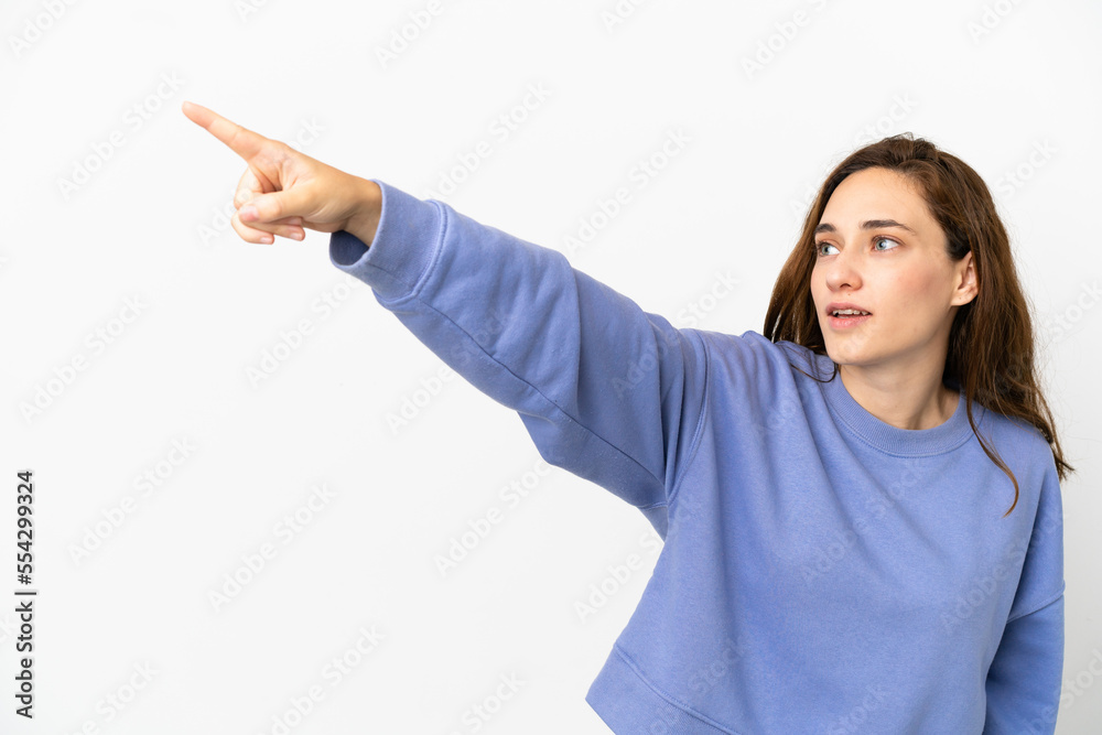 Young caucasian woman isolated on white background pointing away Young caucasian woman isolated on white background pointing away