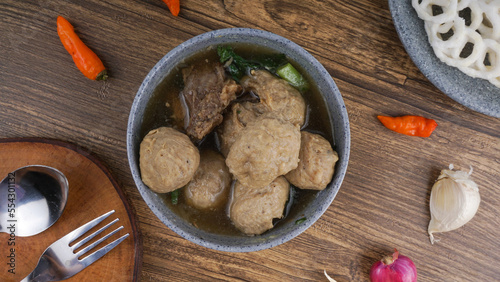 Beef meatballs served in bowl wooden background. Top View. Indonesia Traditional Food