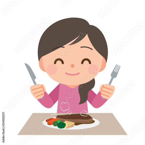 ステーキを食べる女性
