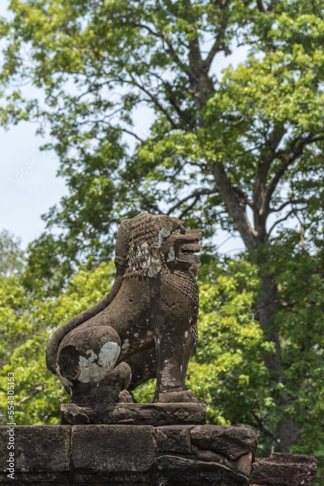 Stone lion covered in lichen guarding steps, East Mebon, Angkor Wat; Siem Reap, Siem Reap Province, Cambodia Stone lion covered in lichen guarding steps, East Mebon, Angkor Wat; Siem Reap, Siem Reap Province, Cambodia