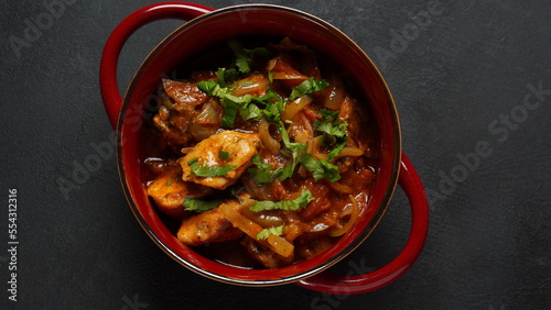 Spanish Chicken stew with tomatoes, onion and spices