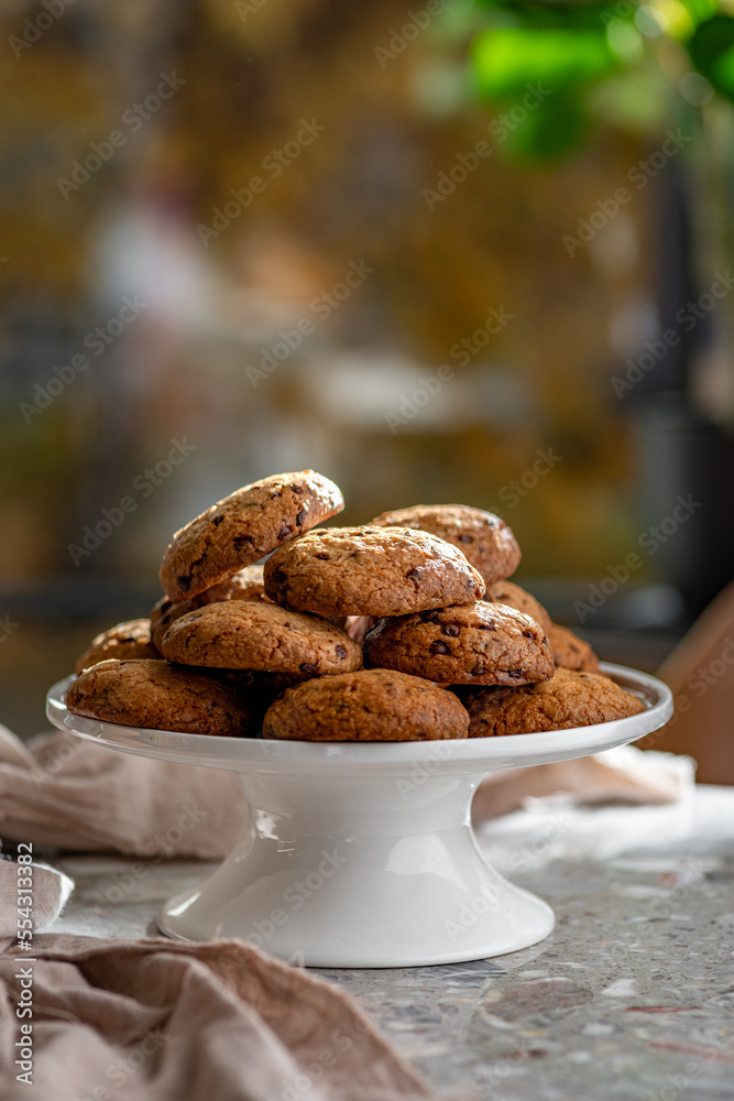 Fototapeta premium Chocolate chip cookies with chocolate chips on a tray.