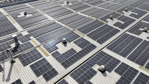solar panles on factory rooftop photo