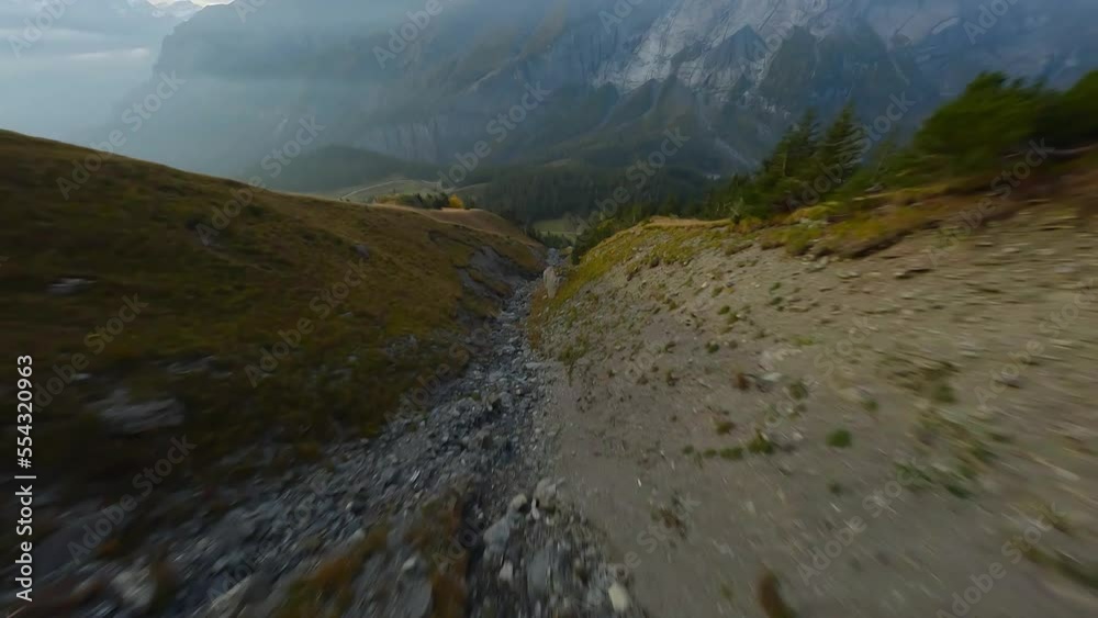 FPV maneuverable flight above the mountain range in Swiss Alps FPV maneuverable flight above the mountain range in Swiss Alps