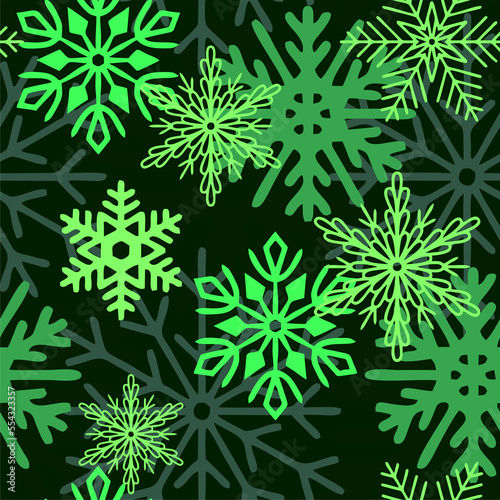 seamless asymmetric pattern of multicolored snowflakes on a green background, texture, design