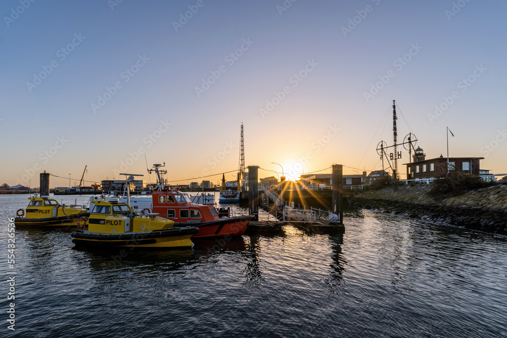 pilot boats in the port of Cuxhaven, Germany at sunset