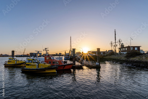 pilot boats in the port of Cuxhaven, Germany at sunset