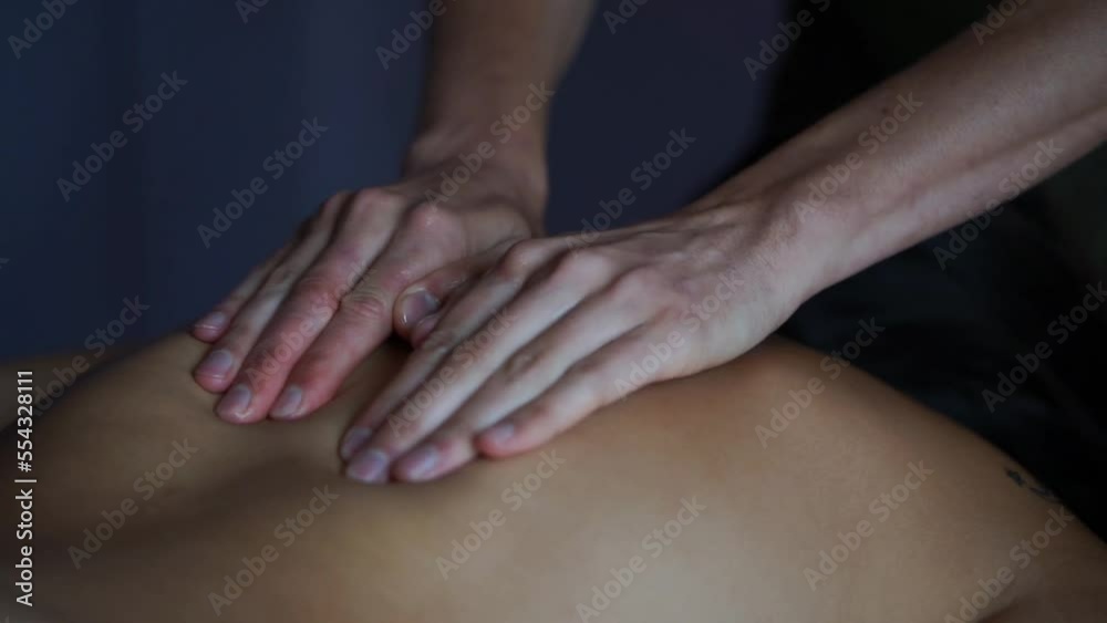 Close up of the hands of an unrecognizable person giving a massage. Horizontal video. Close up of the hands of an unrecognizable person giving a massage. Horizontal video.