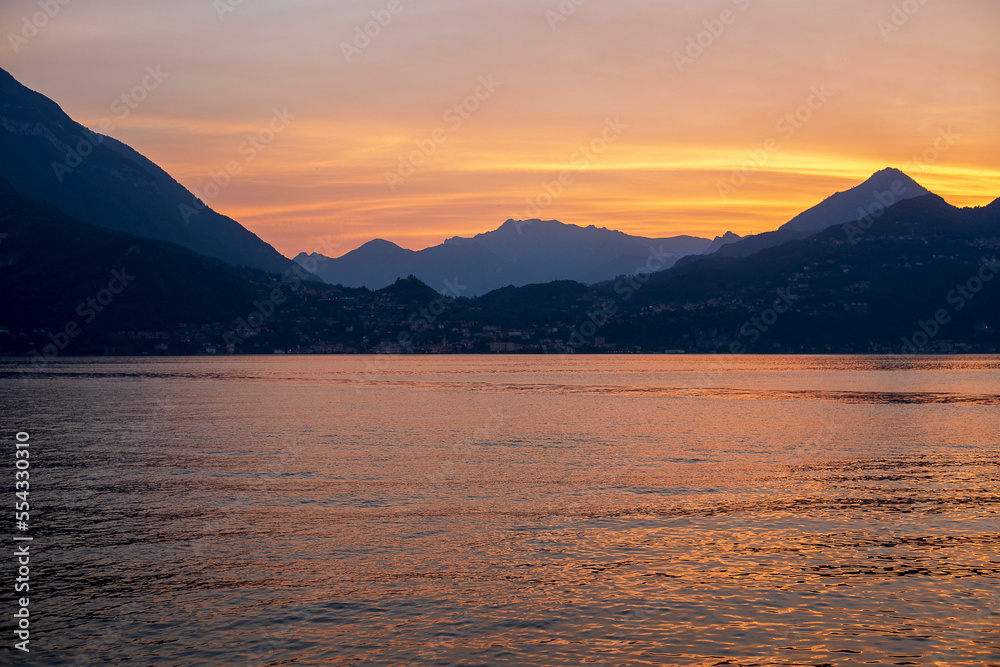 Scenic View Of Lake and Mountains Against Sky During Sunset. Como Lake, Italy