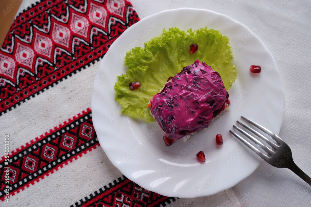 Dressed herring aka herring under a fur coat salad. Traditional Ukrainian food.
