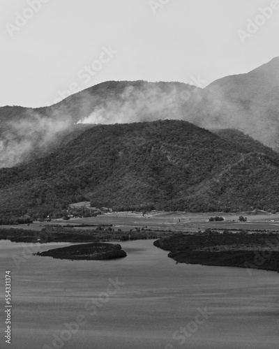 Mouth of Mowbray River flowing into Trinity Bay-smoky background mountains. Mowbray-Australia-335 photo