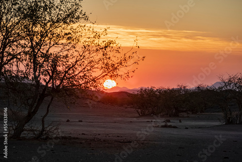 Sunset in Damaraland; Kunene Region, Namibia photo