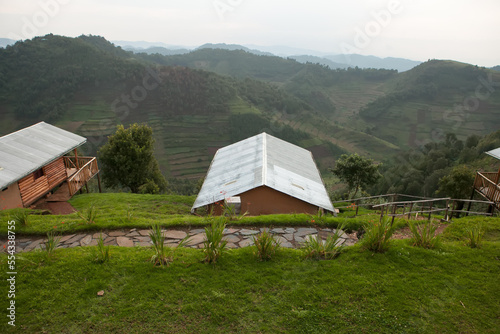 A rustic lodge overlooks the mountains in Bwindi National Park.; Bakiga Lodge, Bwindi Impenetrable National Park, Uganda photo