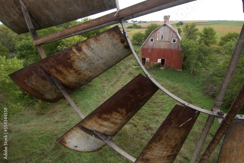 Turn-of-the-century peg barn as seen through a wind vane; Princeton, Nebraska, United States of America photo