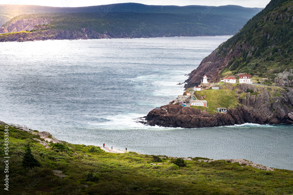 Φωτογραφία Fort Amherst Lighthouse historic site photograph taken from Signal hill with tourists overlooking a cliff near St