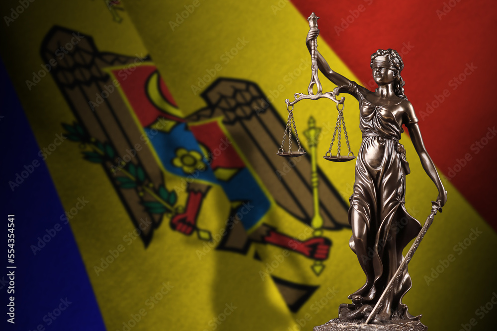 Obraz na płótnie Moldova flag with statue of lady justice and judicial scales in dark room. Concept of judgement and punishment, background for jury topics w salonie