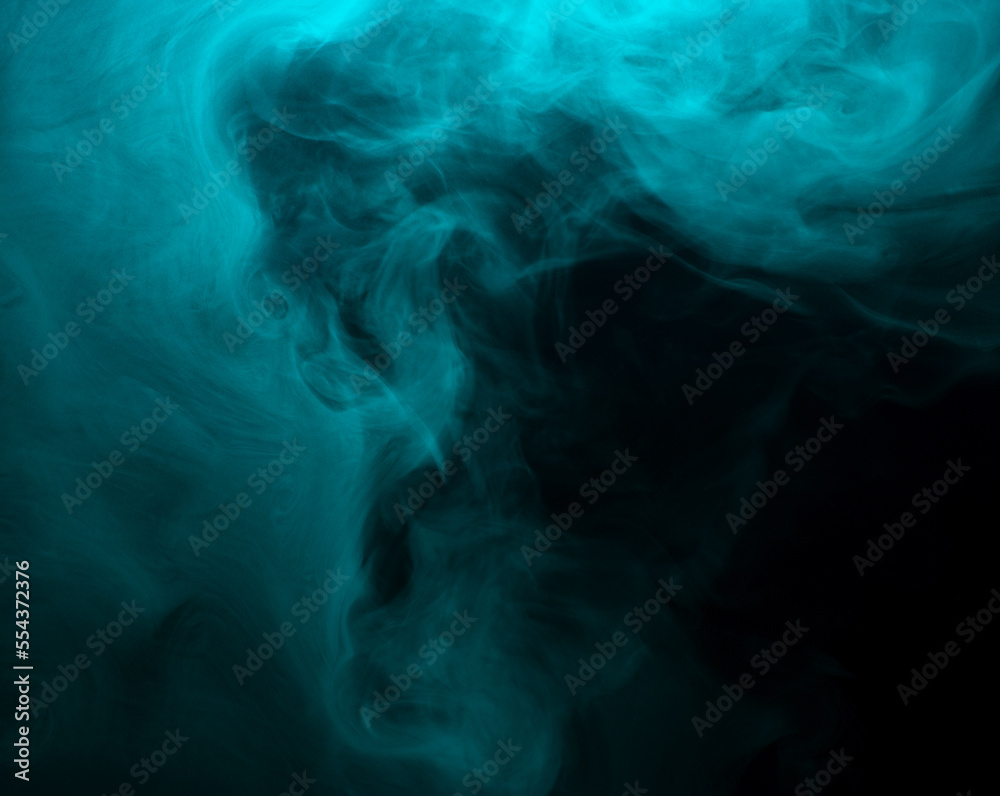 Abstract background of chaotically mixing clouds of turquoise smoke on a background of darkness