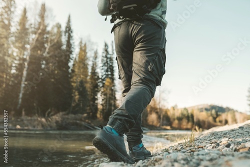 Fotografi Dark men's trousers on a walk