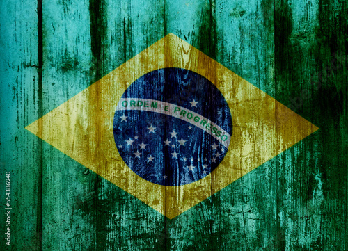Brazilian flag on old wood plank
